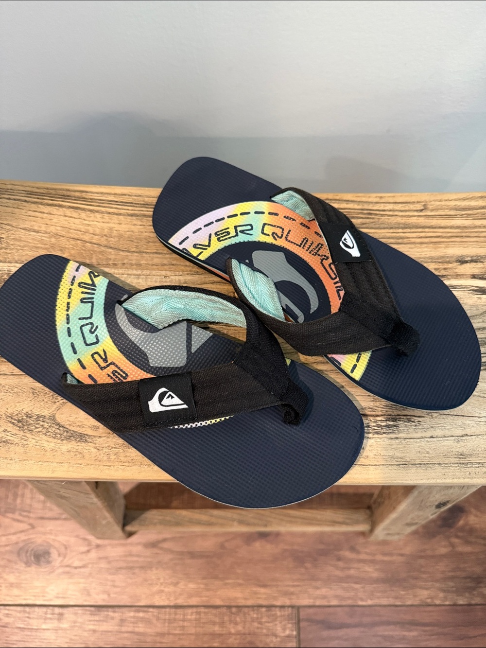 Quiksilver Navy Flip Flops with Colorful Logo Footbed and Black Straps